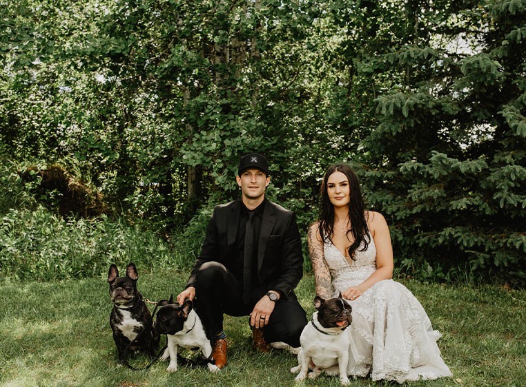 The owners and their pets on their wedding day.